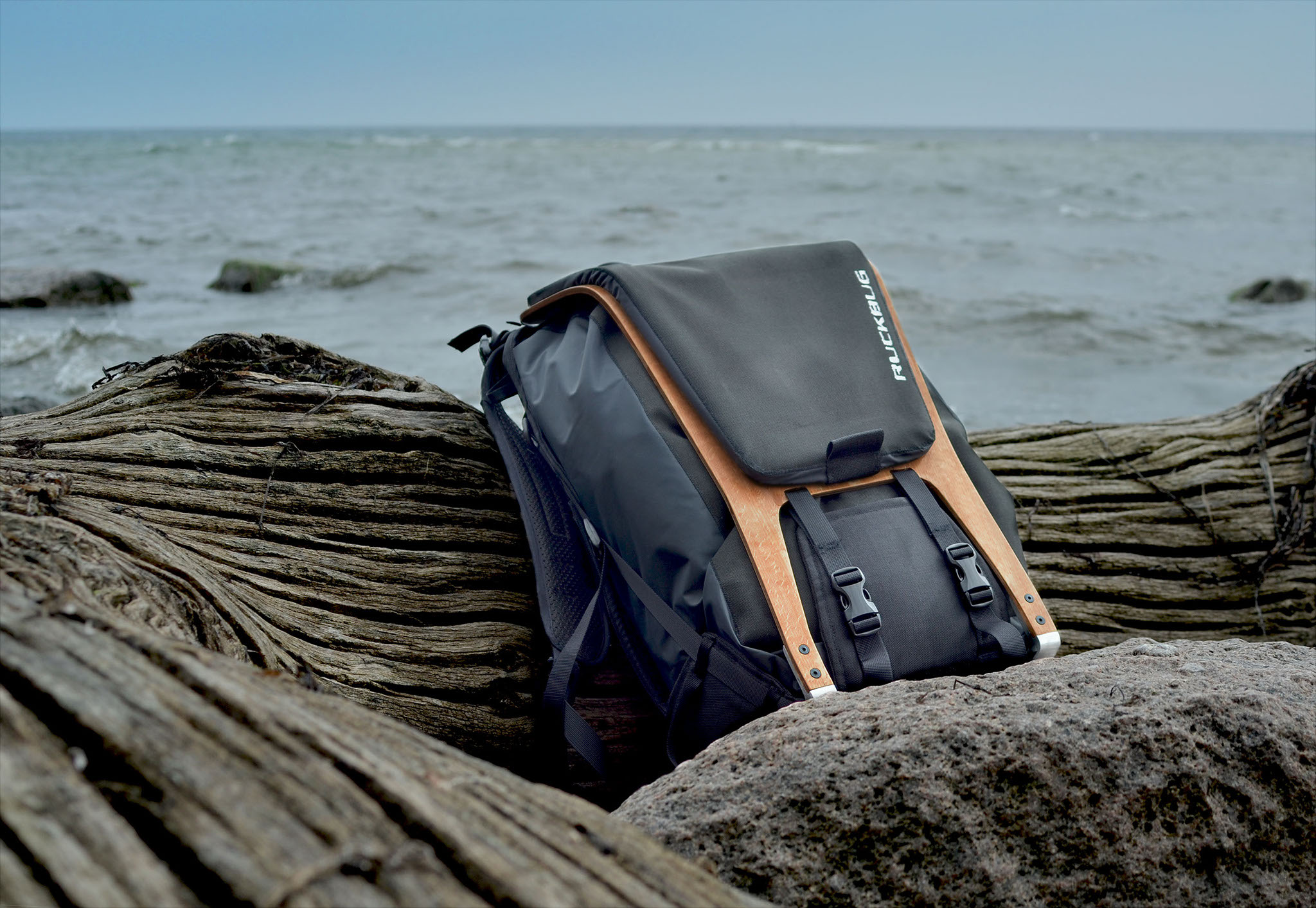 RUCKBUG - outdoor backpack RUCKBUG outdoor backpack on rough wood